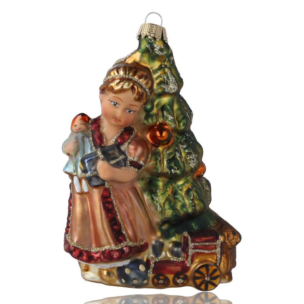Mergaitė prie eglutės